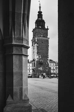Gothic Town Hall Tower through Cloth Hall arcade, Kraków Old Town, wide angle Stock Photos
