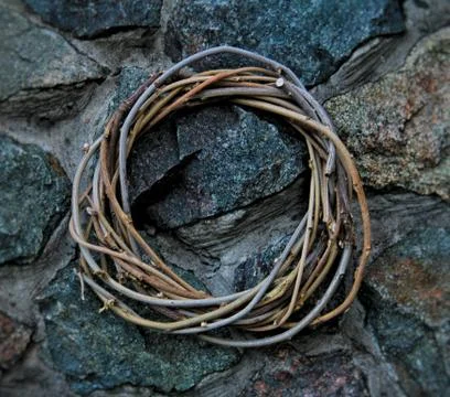 Gothic wreath on a stone wall 库存照片