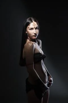 Gothic young girl posing with pattern on body Stock Photos