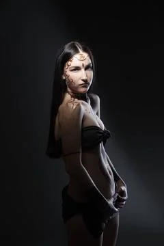 Gothic young girl posing with pattern on body Gothic young girl posing wit... Stock Photos