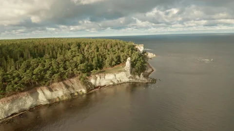 Gotland chalk cliffs, Aerial View Flying Over Ocean Next To the coastal line Stock Footage 142028616