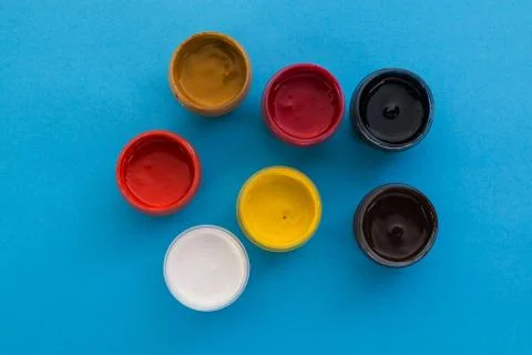 Gouache on a blue background Stock Photos