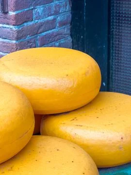 Gouda cheese, one of the most famous cheeses of the Netherlands, has a uniq.. Stock Photos