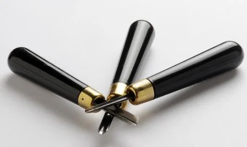 Gouges with black handle on a white background Stock Photos