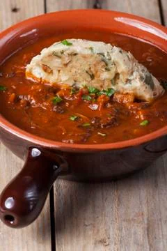 Goulash with a dumpling slice Stock Photos