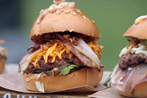 Gourmet Bacon Cheeseburger, Layers of Indulgence Stock Photos