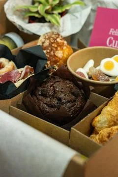 Gourmet breakfast box with assorted pastries and sweet treats Stock Photos