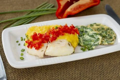 Gourmet Cod Fillet with Bell Pepper Salsa and Spinach Omelette on Elegant Plate Stock Photos