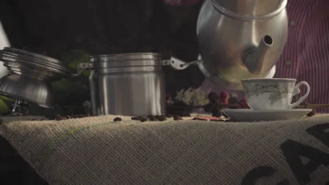 Gourmet coffee being served by rustic coffee maker in an outdoor environment Stock-Footage 164093678