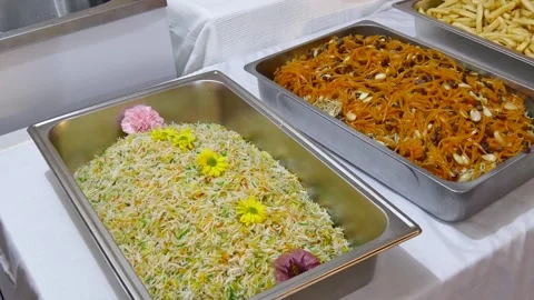 Gourmet dining featuring savory BBQ skewers, roasted beef with gold potatoes Stock Footage 334844709