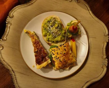 Gourmet Dish with Assorted Snacks Stock Photos