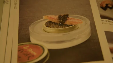 Gourmet Dish Featured on Restaurant Menu in Beijing, China Close-Up Stock Footage 345765024