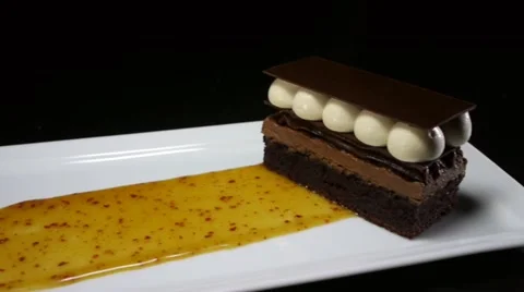 Gourmet dish luxury fine dining  restaurant food Chocolate Cake dessert Vídeo Stock 21845105