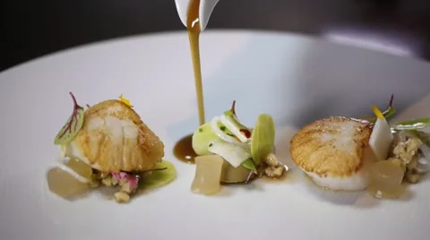 Gourmet dish luxury fine dining restaurant food scallop sauce fine dining Stock Footage