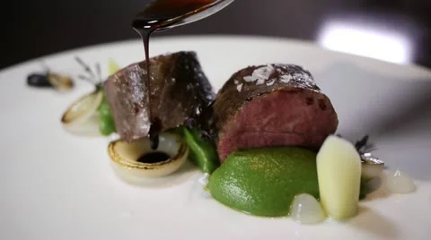 Gourmet dish luxury restaurant food beef roast fine dining Stock Footage