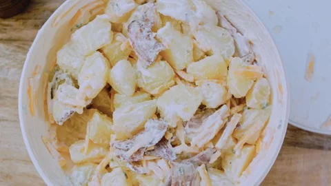 Gourmet fine dining angle: arranging the loaded potato salad Stock Footage 342198918