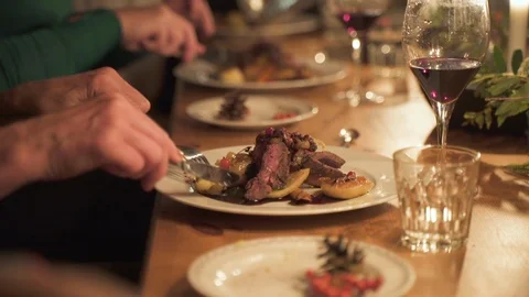 Gourmet Fine Dining Cuisine Woman Eats Steak at Dinner Table Stock Footage