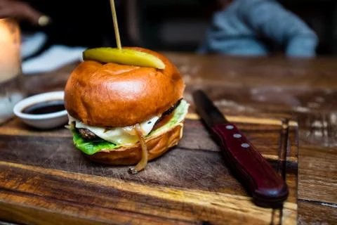 Gourmet hamburger and drinks Stock Photos