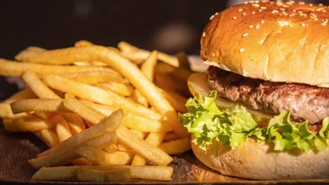 Gourmet Hamburger With Fries Video stock 236034883