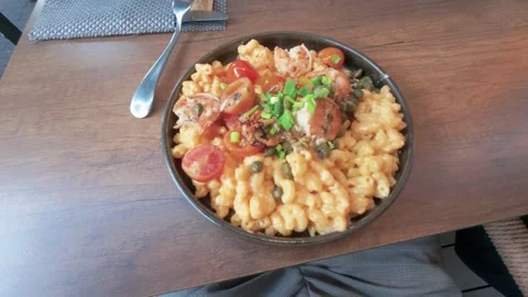 Gourmet Macaroni and Cheese with Cherry Tomatoes and Fresh Herbs on Restaurant Stock-Footage 338166659