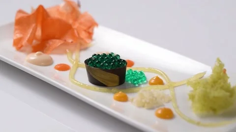 Gourmet sweet dessert in a rectangular plate on a white background. Stock Footage 131978093