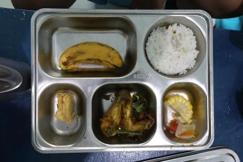 Government nutritious meals program continues amid food poisoning, Keutapang, In Fotos Stock