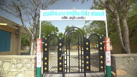 Government School Gate with Blue Window Stock Footage 325090928