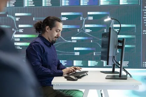 Governmental hackers performing a cyber attack simulation Foto stock