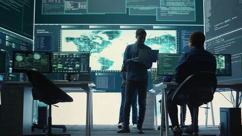 Governmental hackers performing a cyber attack simulation Stock-Fotos