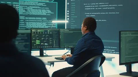 Governmental hackers using advanced software to protect against cyber threats 스톡 사진