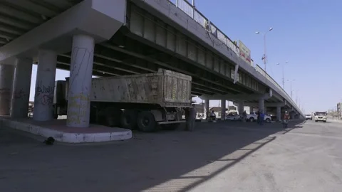 Government's workers remove rubble of streets at Fallujah, Iraq Stock Footage 150003742