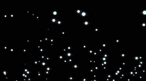 Gowing star particle in random direction with bounce on spotlight ground abst Stock Footage 65767739