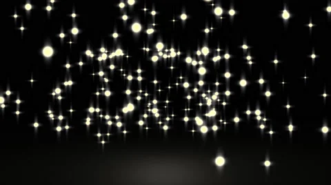 Gowing star particle in random direction with bounce on spotlight ground abst Stock Footage 65767746