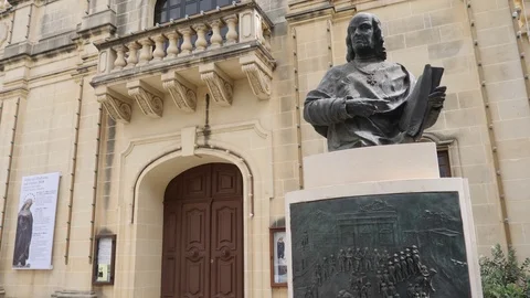 Gozo,Malta-Low angle shot of statue of a man in Victoria public square Stock Footage 89188466