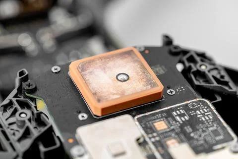 GPS module with a ceramic antenna for receiving signals from satellites. Stock Photos