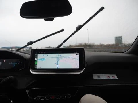 GPS navigation system in a car with map on screen Stock Photos