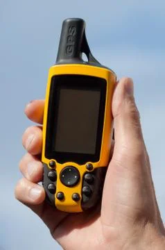Gps navigator in the hand Stock Photos