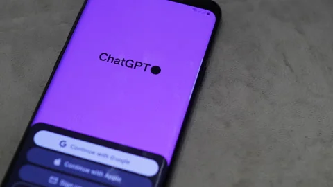 GPT Chat applications are launched on a smartphone. The Artificial Intellig.. Stock Footage 262719037