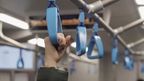 Grab the handrail in the subway Stock Footage 139533727