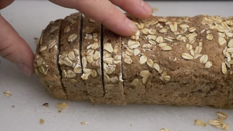Grabbing and taking away several slices of bread 库存影片 290123856