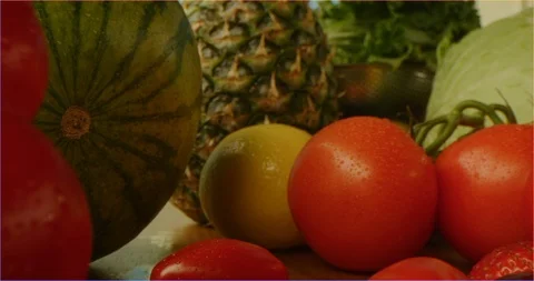 Grabbing cherry tomatoes, sliding over cooking table Stock Footage 126304468