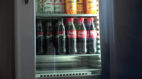 Grabbing Coca Cola from refrigerator 4k 스톡 동영상 55651122