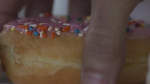 Grabbing A Donut Macro Stock Footage 281023805
