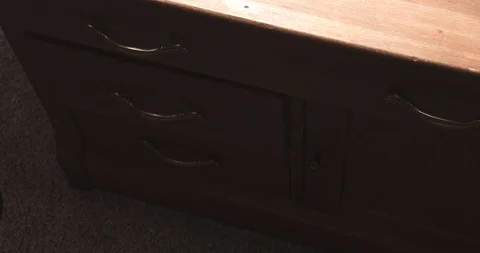 Grabbing a Gun from a Drawer Stock Footage 85653077