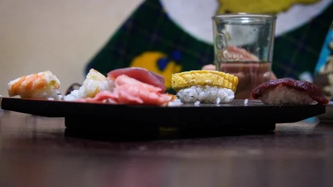 Grabbing a Piece of Sushi Side - Kyoto, Japan Stock Footage 95705853
