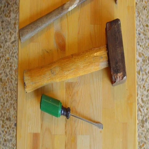 Grabbing The Right Tools Hammer Stock-Footage 69574514