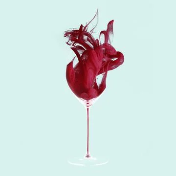 Grace. Creative artwork. Red wine texture made of red dye, liquid with drops and Stock Photos