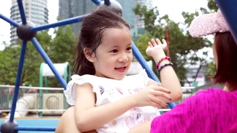 Grace play w mom Stock Footage 83872210