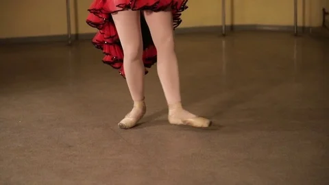 A graceful ballerina dancing ballet elements Stock Footage 83071195