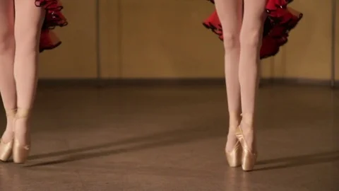 A graceful ballerina dancing ballet elements Stock Footage 83071851